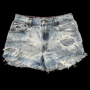Woman’s Levi’s 550 Relaxed Tapered Frayed Stars Shorts